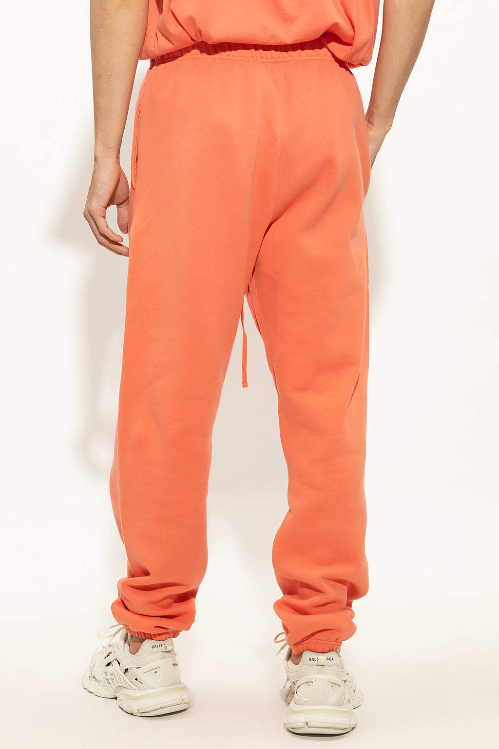 Orange Sweatpants with logo Fear Of God Essentials ...